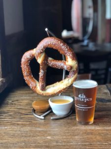 Little Pub/Big Pretzel Enormous soft baked Bavarian pretzel served with a four-cheese sauce and honey mustard dip